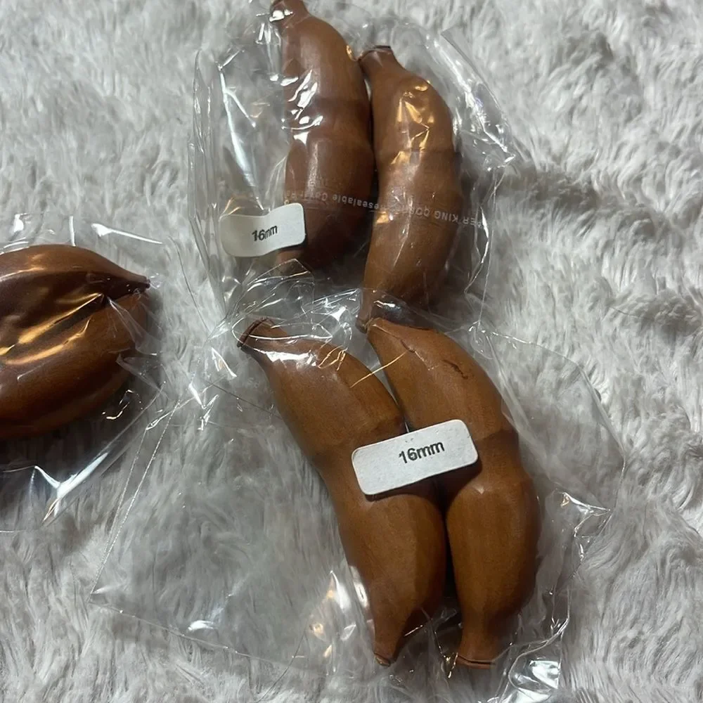 Pair carved banana wood tapers plugs heavy multiple sizes